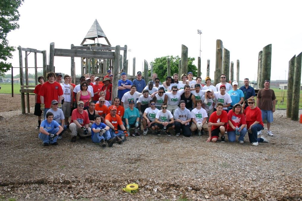 Demolition day group posing for photo